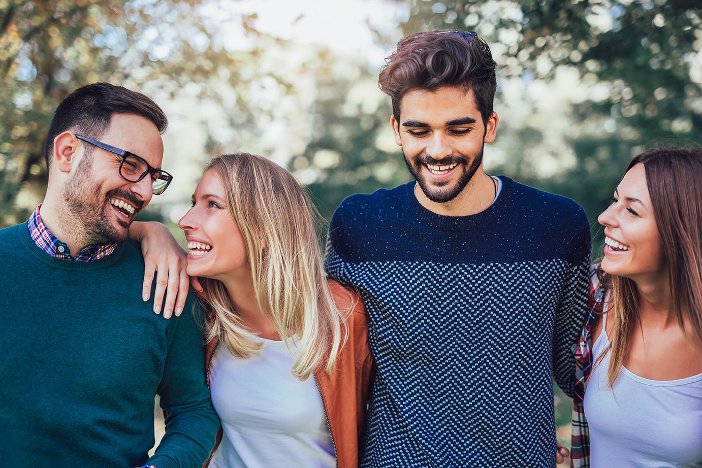 group of four people smiling in aurora colorado