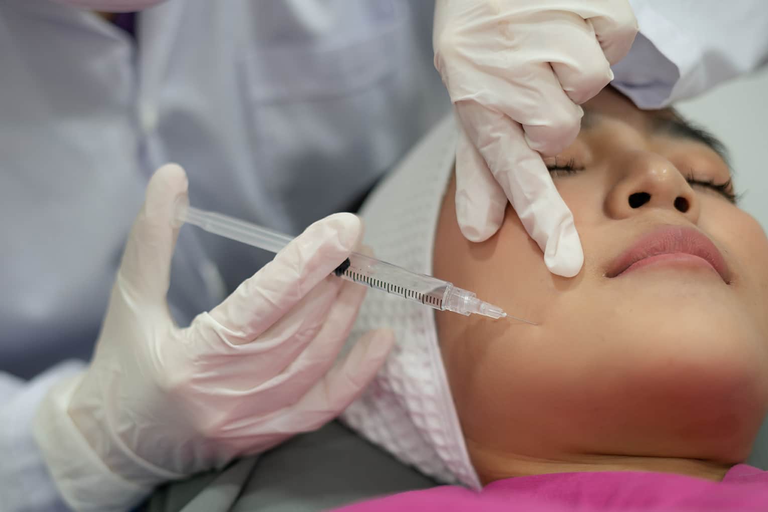 female dental patient relaxing during a Botox Dental Appointment at odonto dental