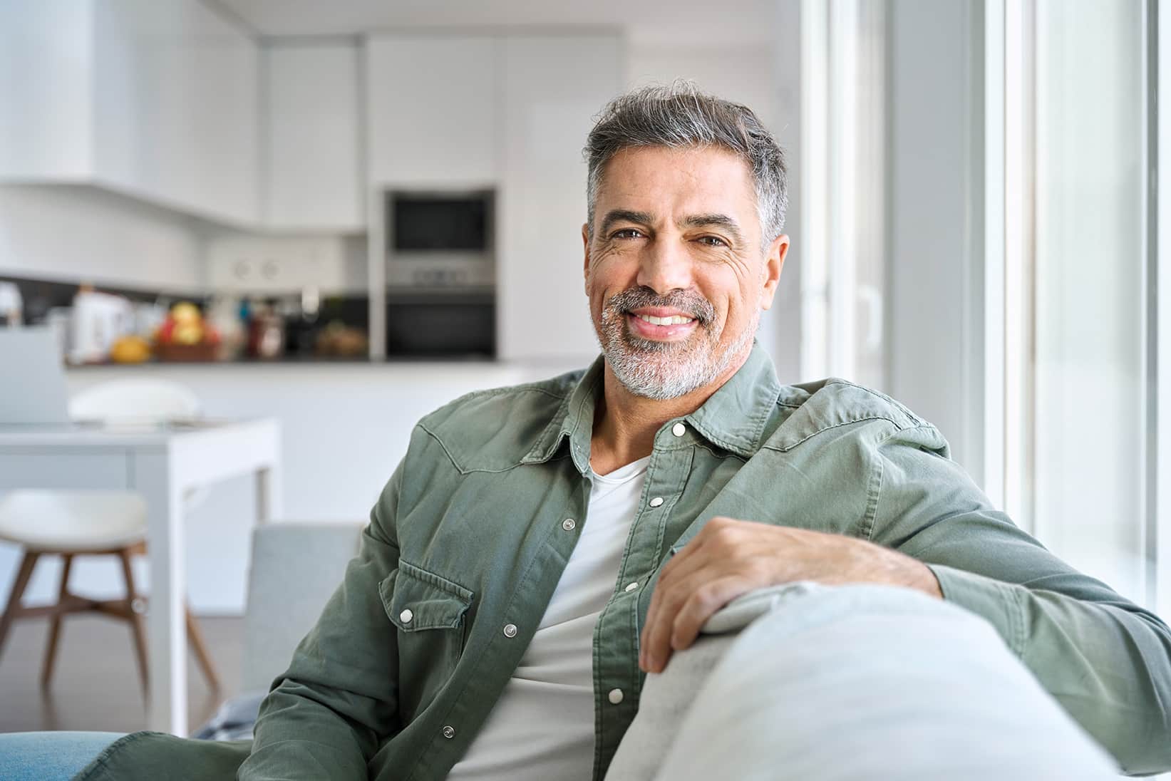 male dental patient smiling in aurora colorado