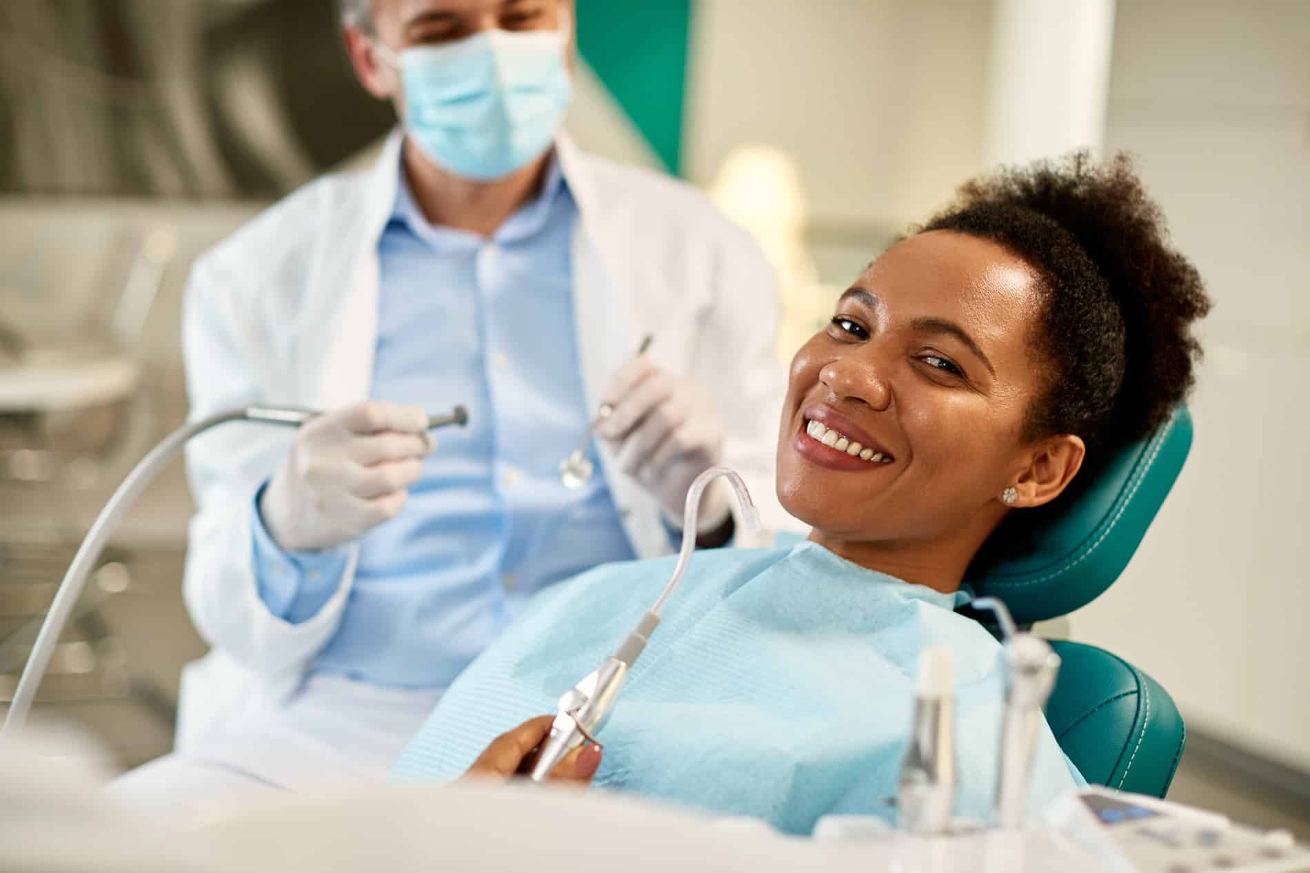 Woman at her tooth extraction appointment in Aurora CO